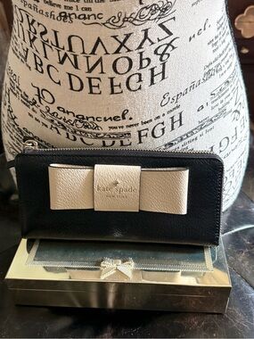kate spade ♠️ Black Leather Zip Around Wallet with Cream Bow Accent